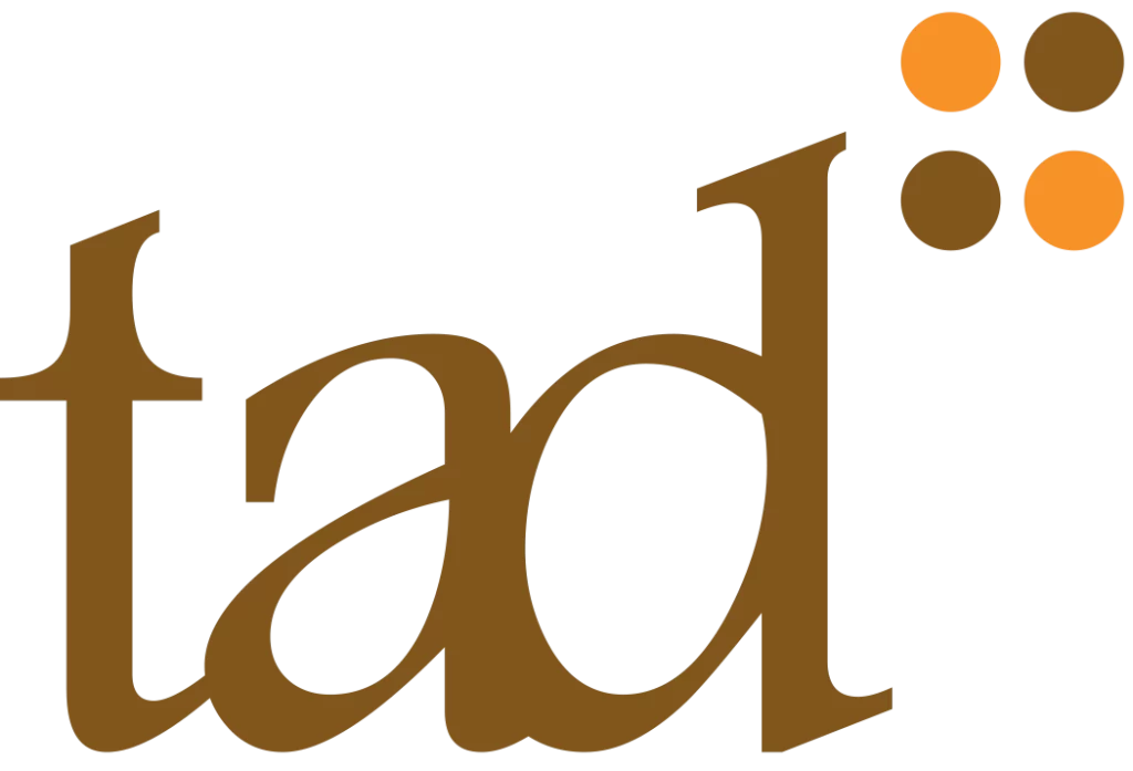 Tad logo with orange and brown tad dots 2nd variation